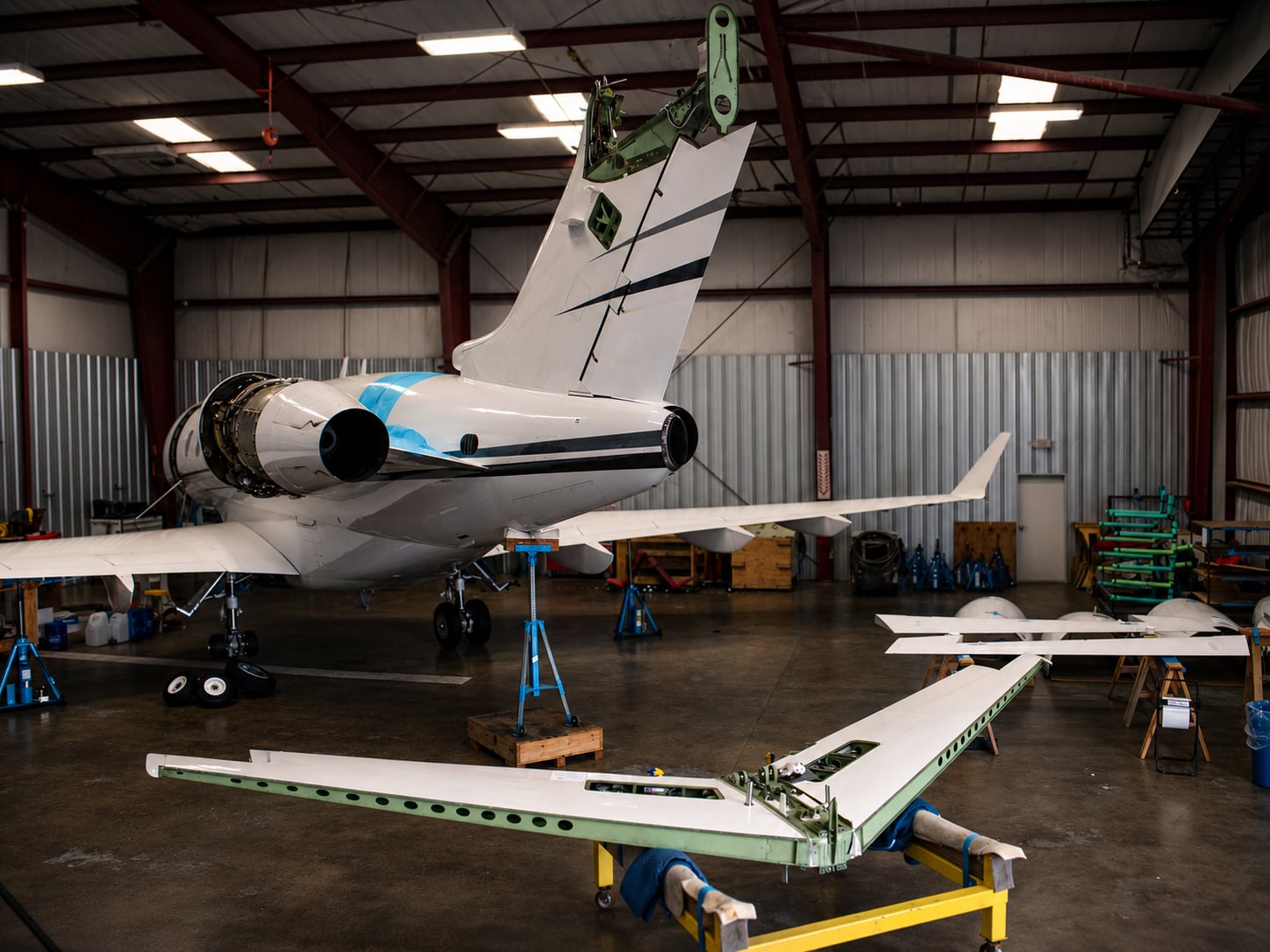 Business jet tail section view in the Plane Place Aviation hangar in Cleburne, Texas